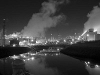 bw night shot of a refinery